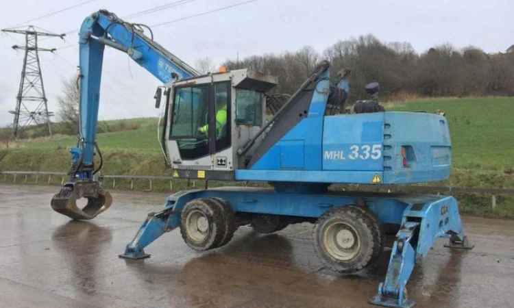 Грейферний перевантажувач Fuchs MHL 335 у продажу - фото № 2