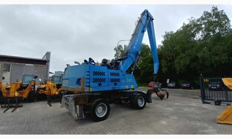 Грейферний перевантажувач Fuchs Terex MHL 340 у продажу - фото № 3