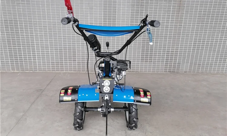 Мотоблок ДТЗ 570БН бензин, 7 л.с., передачи 3/1, колеса 4, 00-10. Разблокираторы колес - фото № 9