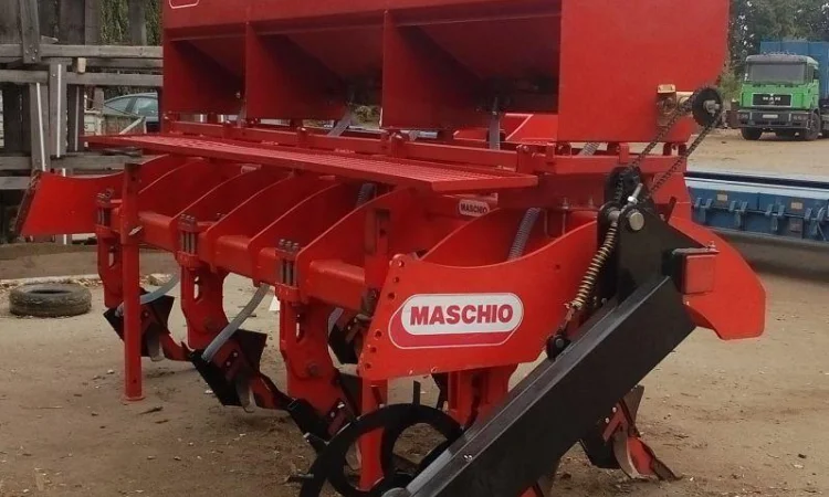 Система внесения сухих минеральных удобрений на глубокорыхлители - фото № 18