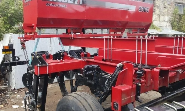 Система внесения сухих минеральных удобрений на глубокорыхлители - фото № 17