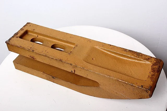 311-01-1008С1 Зуб ковша для погрузчика Сталева Воля Л-34 - фото № 1