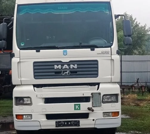 Вантажний сідловий тягач MAN TGA 18.440 з напівпричіпом (Штора) - фото № 3