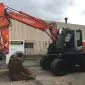 Колесный экскаватор Hitachi ZX 140 W-3 - фото № 1
