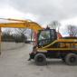 Колесный экскаватор JCB JS 200W. Купить экскаватор б/у - фото № 1