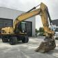 Колесный экскаватор Caterpillar M318D 2008 года - фото № 1