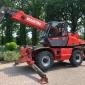 Поворотный телескопический погрузчик Manitou MRT 2150 - фото № 8
