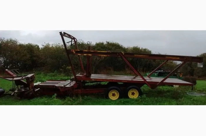 Самозавантажувальний причіп NEW HOLLAND 1006- фото № 1