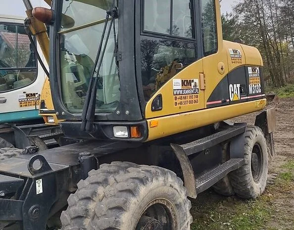 Caterpillar M313 2006- фото № 1