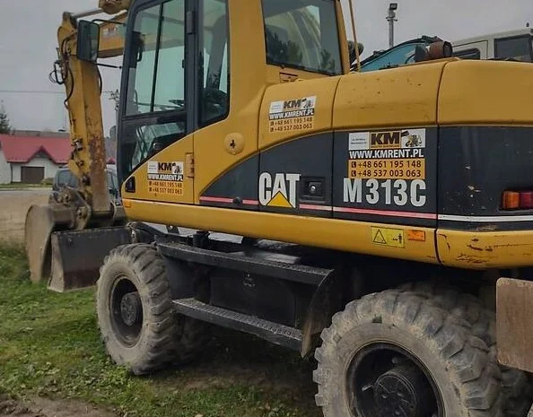Caterpillar M313 2006- фото № 2