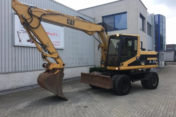 Колесный экскаватор Caterpillar M315- фото № 2