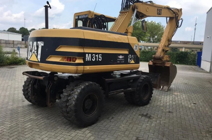 Колесный экскаватор Caterpillar M315- фото № 3