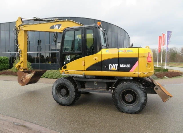 Колесный экскаватор Caterpillar M313D- фото № 1