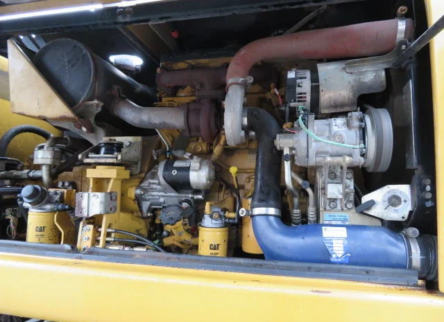 Колесный экскаватор Caterpillar M313D- фото № 4