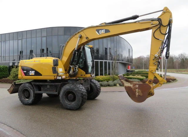 Колесный экскаватор Caterpillar M313D- фото № 5