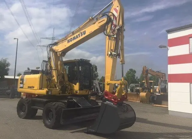 Колесный экскаватор Komatsu PW200- фото № 9