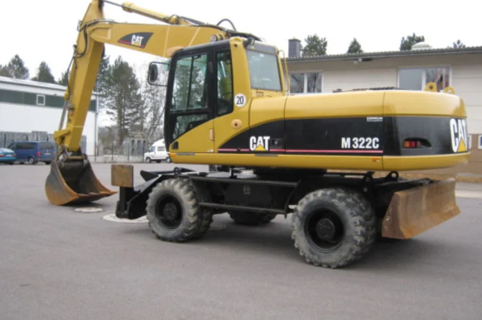 Колесный экскаватор Caterpillar M322С- фото № 4