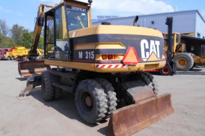 Колесный экскаватор Caterpillar M 315 в Украине- фото № 2