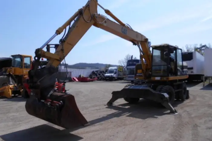 Колесный экскаватор Caterpillar M 315 в Украине- фото № 4