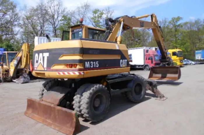 Колесный экскаватор Caterpillar M 315 в Украине- фото № 5