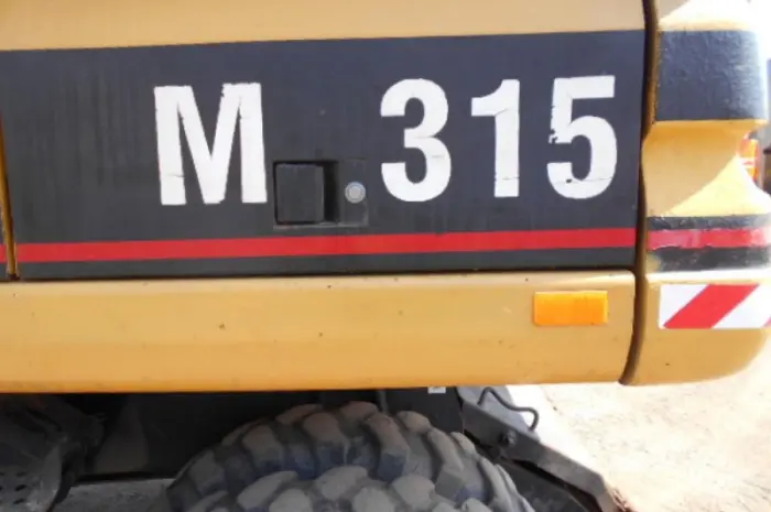 Колесный экскаватор Caterpillar M 315 в Украине- фото № 6