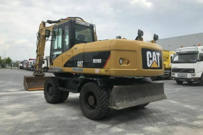 Колесный экскаватор Caterpillar M318D 2008 года- фото № 2