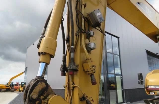 Колёсный экскаватор Caterpillar M316C 2003 года- фото № 7