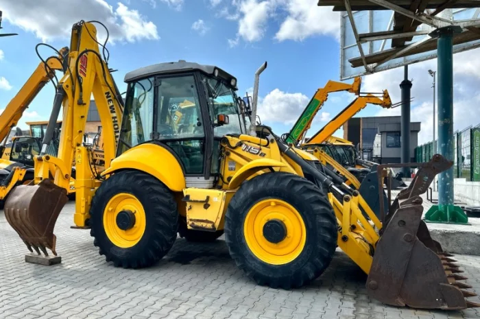 Екскаватор- навантажувач New Holland B115 - 2009 рік- фото № 2