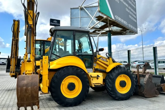 Екскаватор- навантажувач New Holland B115 - 2009 рік- фото № 3