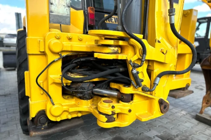 Екскаватор- навантажувач New Holland B115 - 2009 рік- фото № 4