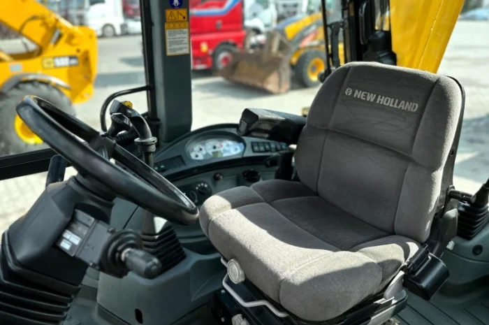 Екскаватор- навантажувач New Holland B115 - 2009 рік- фото № 8