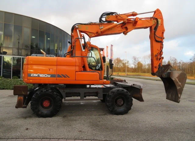 Колесный экскаватор Doosan DX160W. Колесный экскаватор б/у- фото № 2
