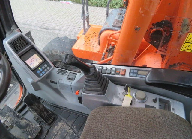 Колесный экскаватор Doosan DX160W. Колесный экскаватор б/у- фото № 5