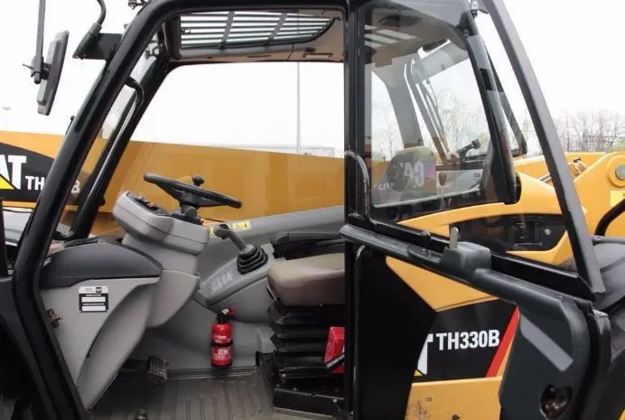 Телескопический погрузчик CATERPILLAR TH330B 4x4x4 2007 года- фото № 2