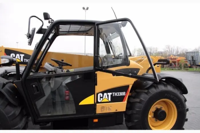 Телескопический погрузчик CATERPILLAR TH330B 4x4x4 2007 года- фото № 5
