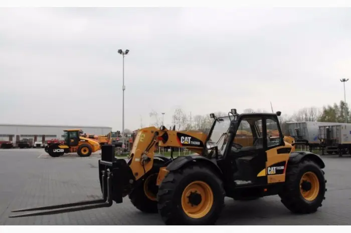 Телескопический погрузчик CATERPILLAR TH330B 4x4x4 2007 года- фото № 7
