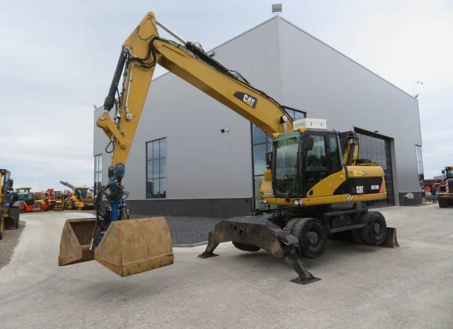 Грейферный перегружатель Caterpillar M318D на продажу- фото № 7