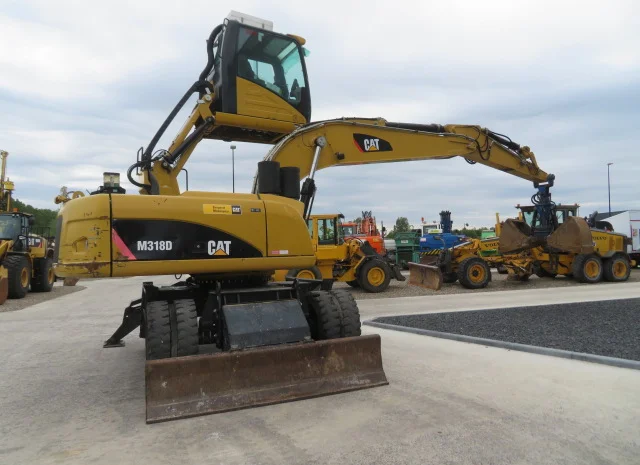 Грейферный перегружатель Caterpillar M318D на продажу- фото № 20