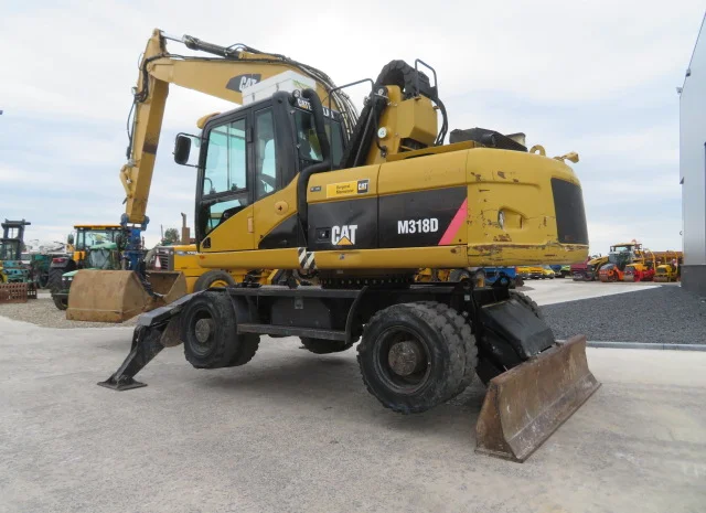 Грейферный перегружатель Caterpillar M318D на продажу- фото № 19