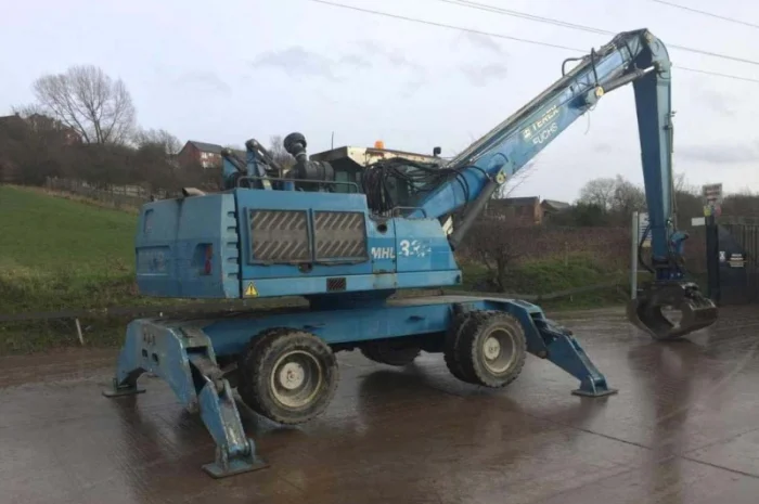 Грейферний перевантажувач Fuchs MHL 335 у продажу- фото № 1