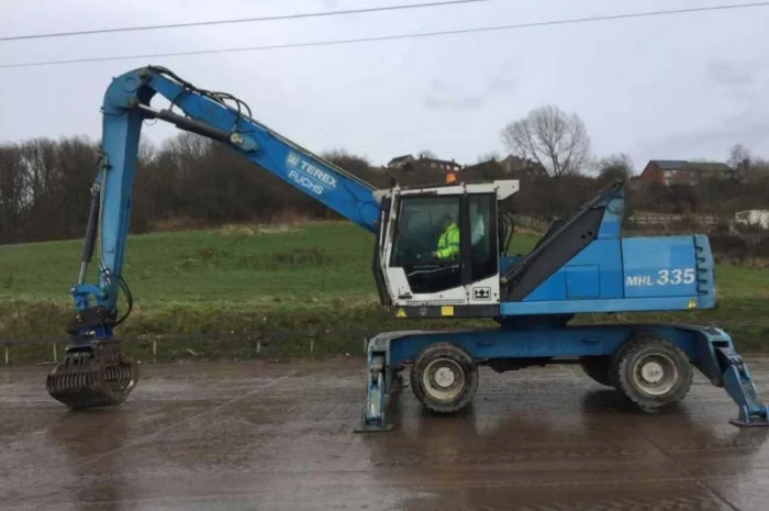 Грейферний перевантажувач Fuchs MHL 335 у продажу- фото № 3