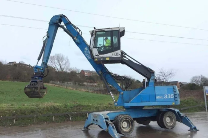 Грейферний перевантажувач Fuchs MHL 335 у продажу- фото № 8