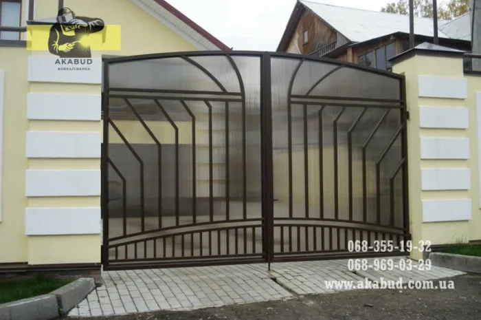 Простые ворота: распашные, откатные. Навесы, перила, решетки- фото № 9