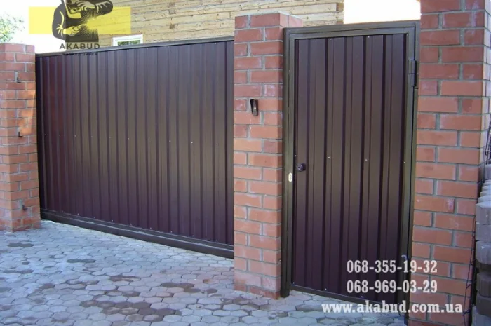 Простые ворота: распашные, откатные. Навесы, перила, решетки- фото № 6