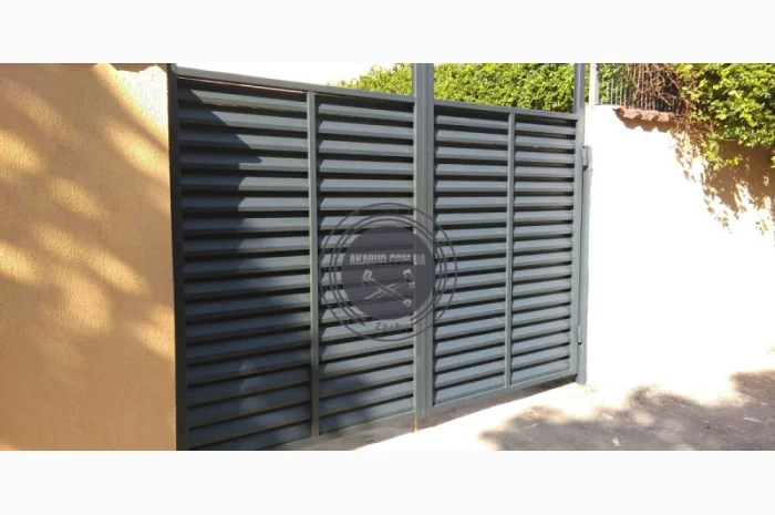 Металлические заборы и ворота-жалюзи для надежной защиты- фото № 9