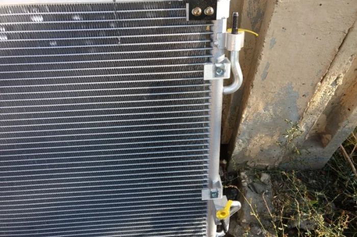 Конденсатор кондиционера Санг енг SsangYong RX290new- фото № 2