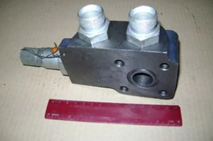 Клапан предохранительный  производства ХТЗ под НШ-32 трактора ХТЗ 151.40.039-4 и НШ-50 тра- фото № 1