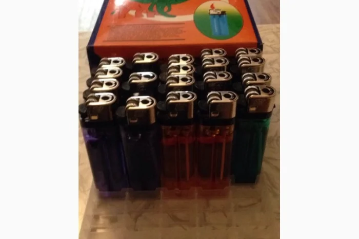 Зажигалки в ассортименте- фото № 3