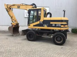 Зображення для оголошення Колесный экскаватор Caterpillar M315
