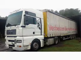 Зображення для оголошення Вантажний сідловий тягач MAN TGA 18.440 з напівпричіпом (Штора)